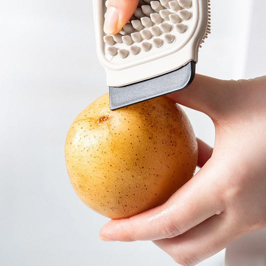 Multifunctional fruit and vegetable brush.