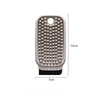 Multifunctional fruit and vegetable brush.